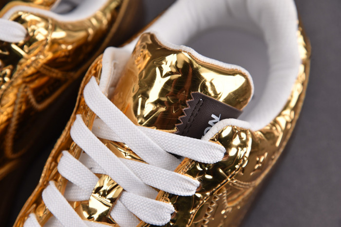 NIKE LOW AIR FORCE 1 X gold